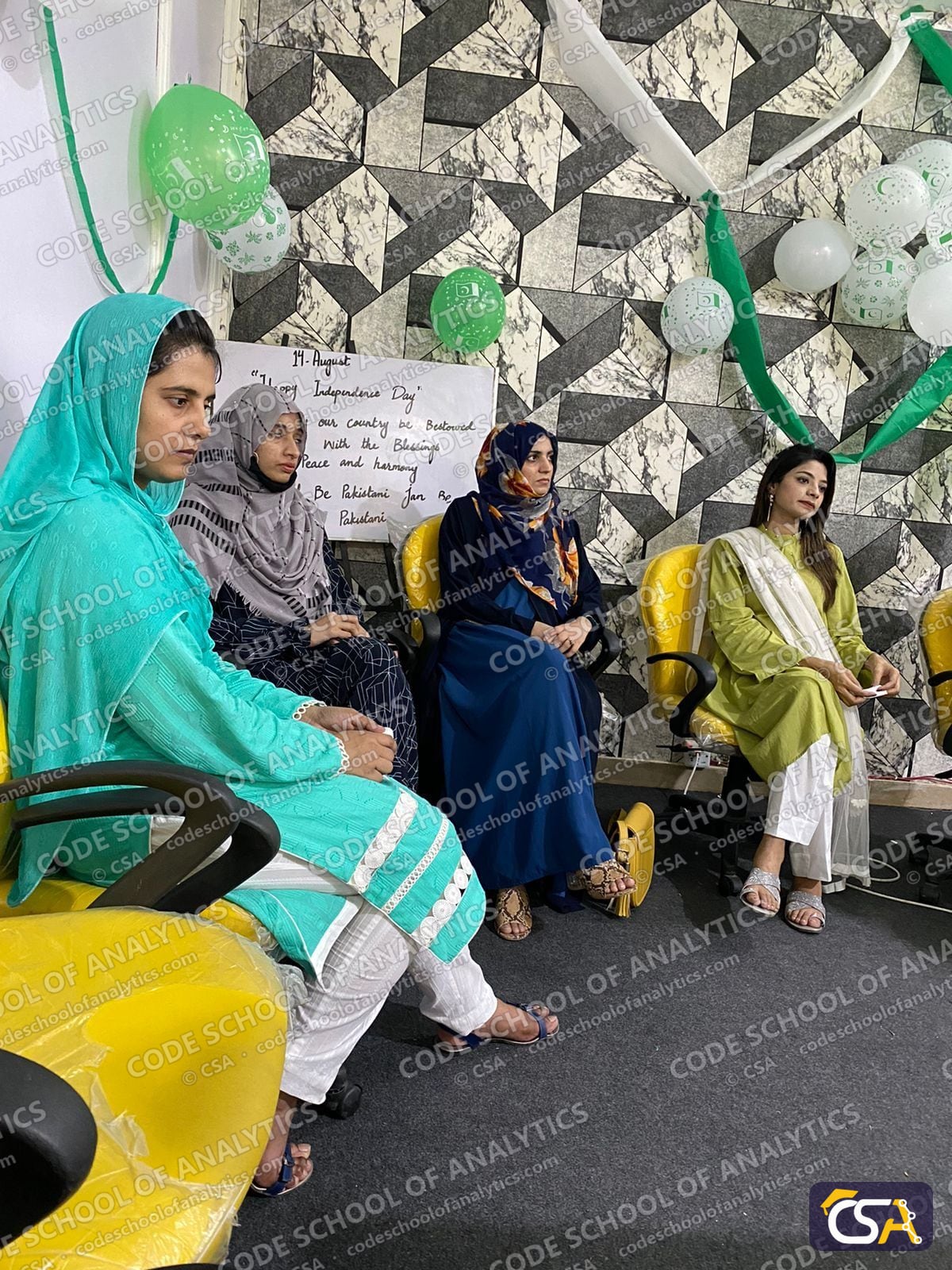 Students seated at the Independence Day celebration
