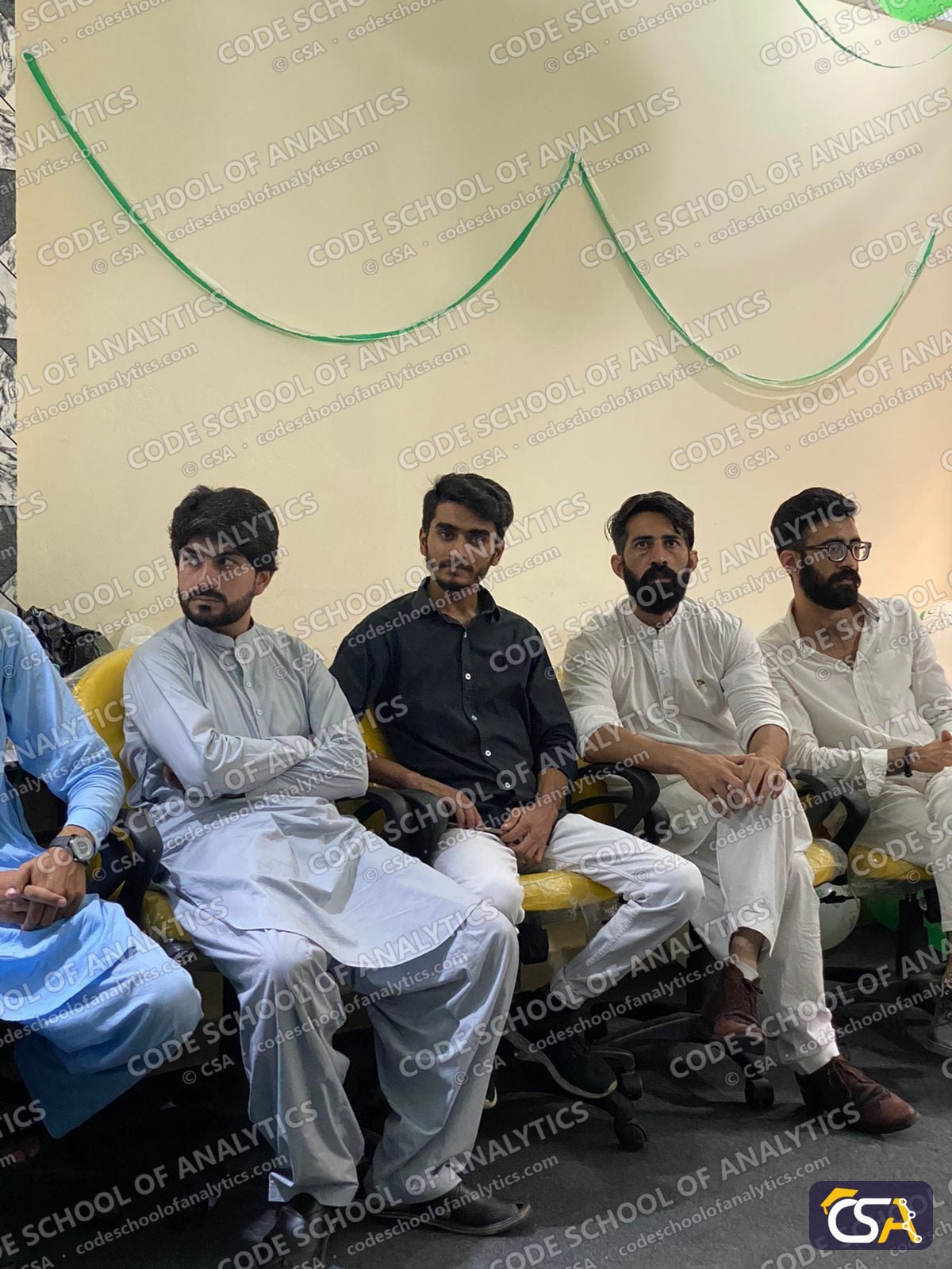 Students in shalwar kameez at the celebration