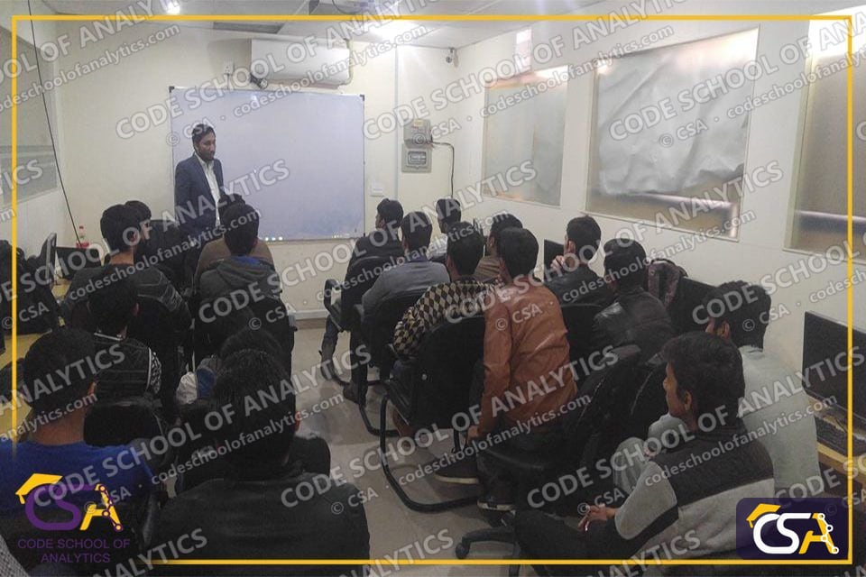 Speaker presenting to a full classroom at the Buraq seminar