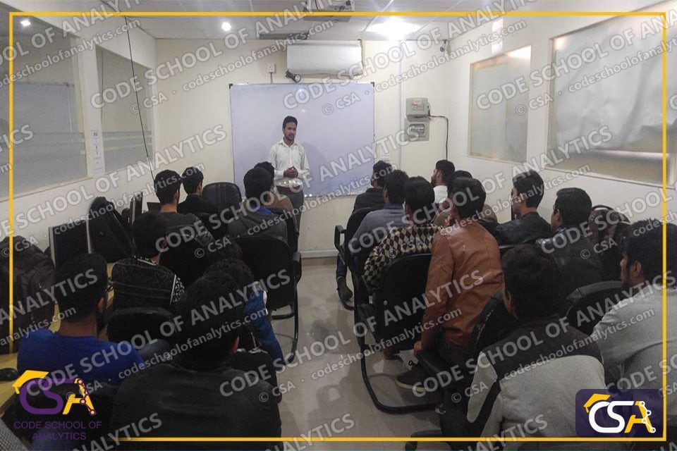 Classroom full of students facing the speaker at the Buraq seminar